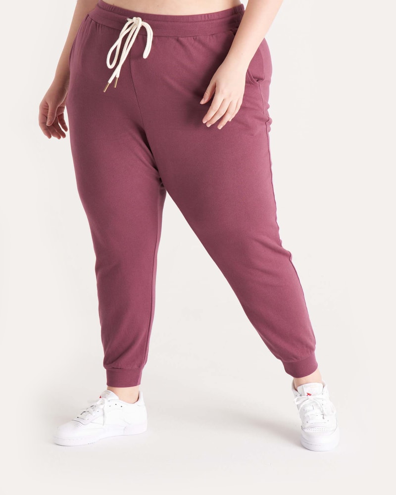 Front of a model wearing a size 3X The Everyday Jogger in Plum by The Standard Stitch. | dia_product_style_image_id:248748